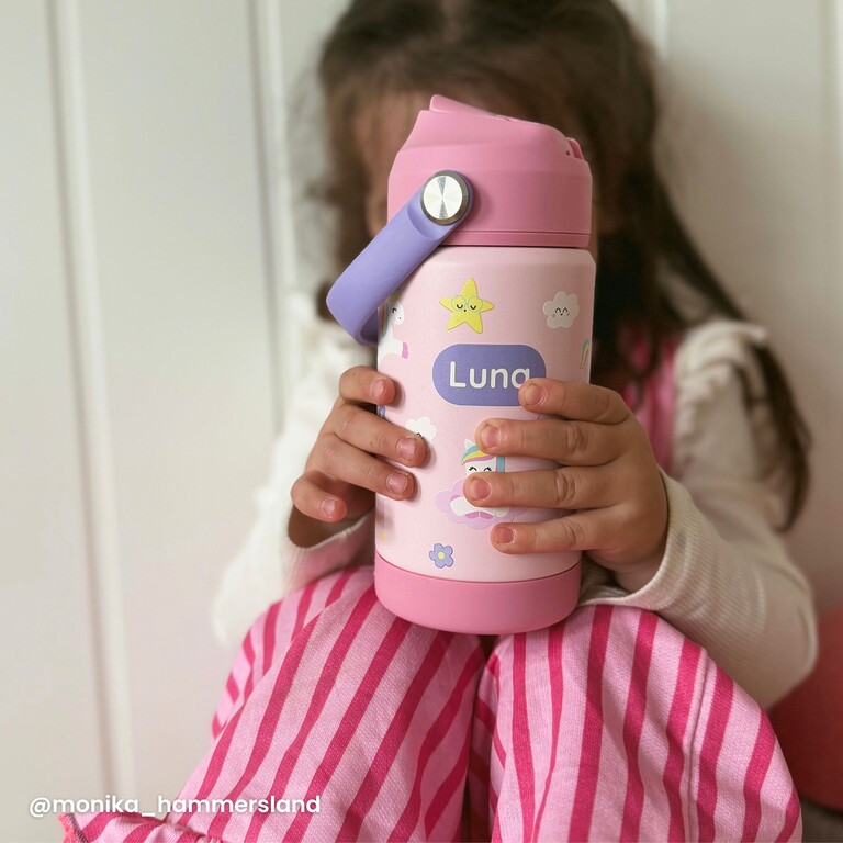Kids drinking bottle in pink , lifestyle