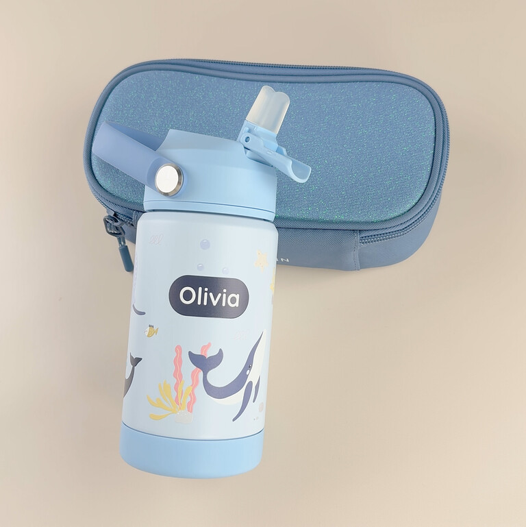 Personalised water bottle with ocean design and the name Olivia