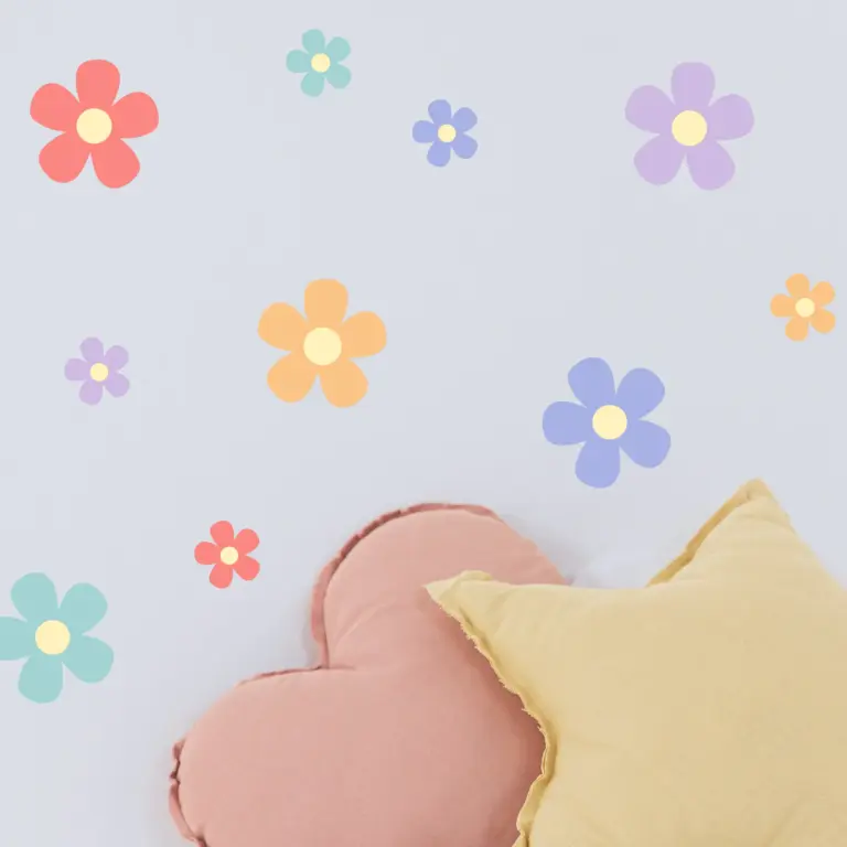 Daisy (multicoloured) wall stickers placed on a wall