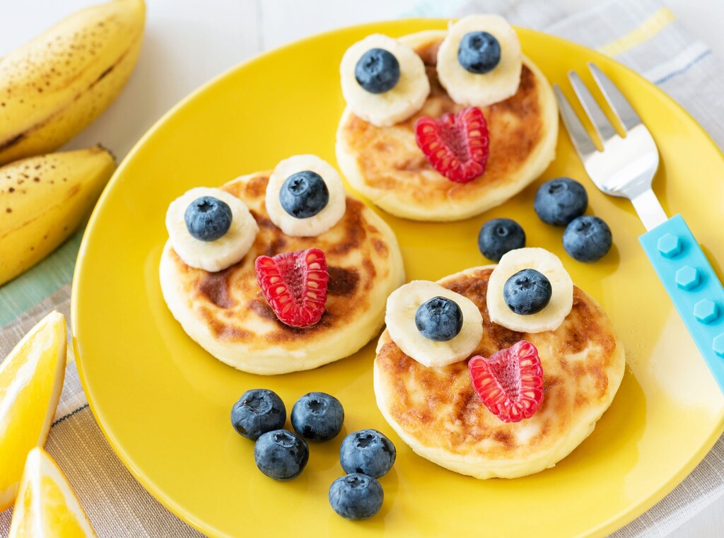 Fun food ideas for picky eaters 2 Smiley face pancakes decorated with banana and blueberry toppings