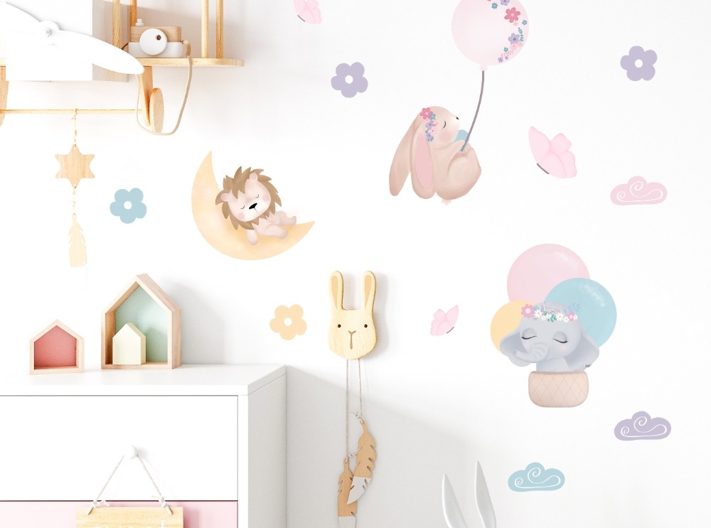 Soft pastel nursery wall stickers with floating animals and balloons