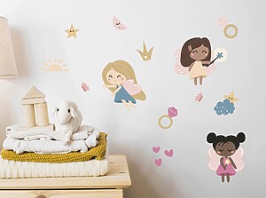 Wall stickers with cute fairy designs decorating a cozy children’s bedroom
