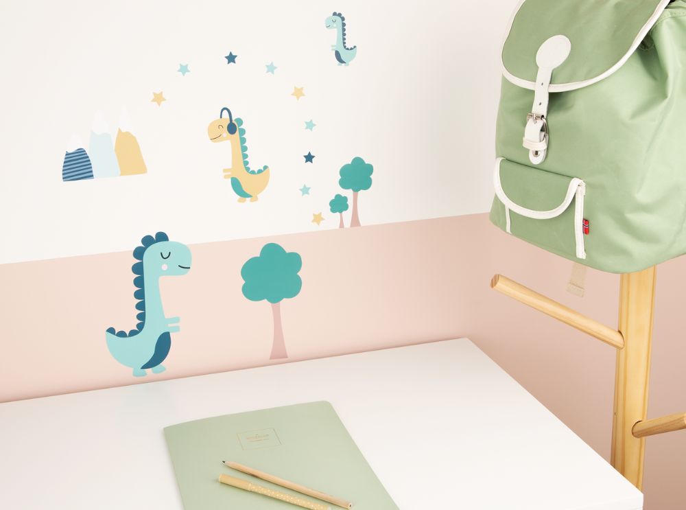 Dinosaur and nature wall stickers in a pastel-colored study area