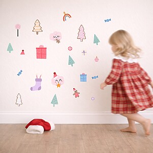 Holly jolly wall stickers on the wall with a child