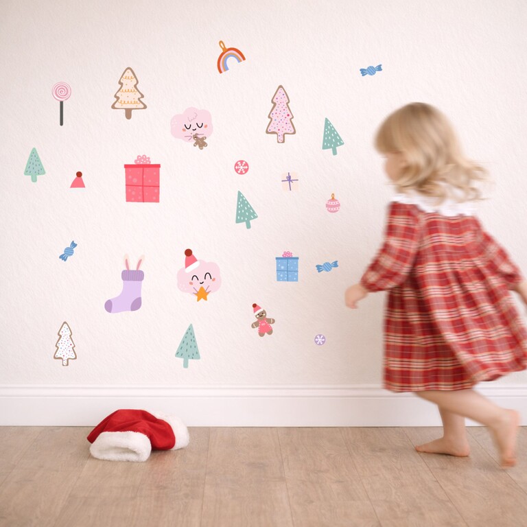 Holly jolly wall stickers on the wall with a child