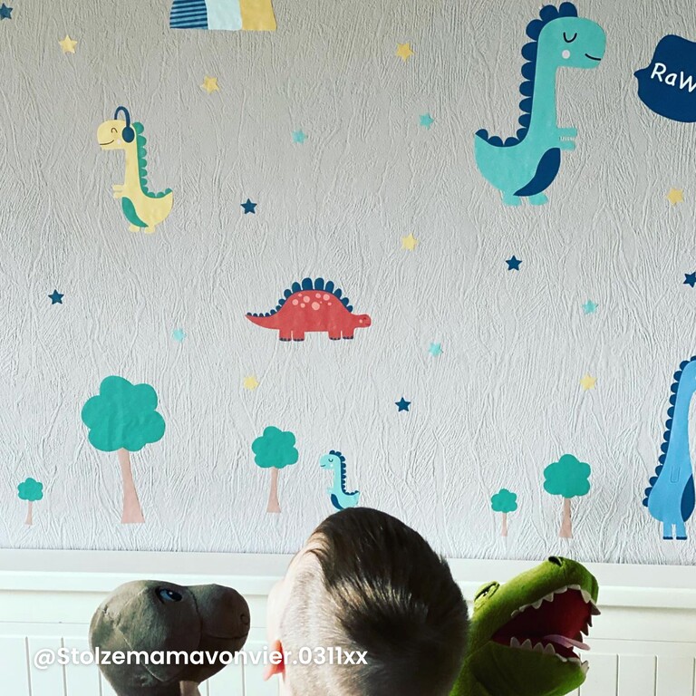 customer photo of dinosaur wall stickers on a wall at a customer's home
