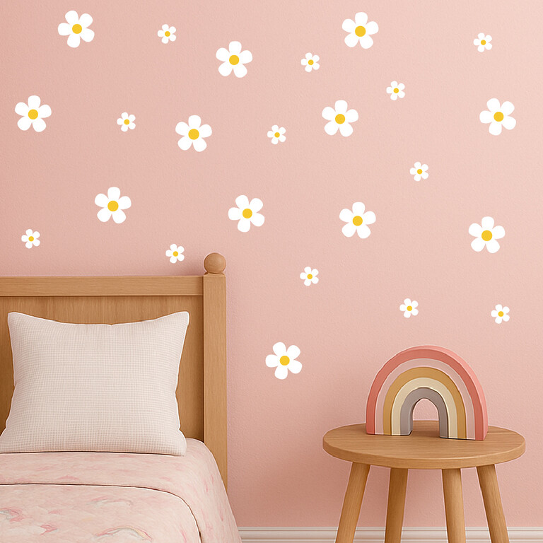 Daisy (white) wall stickers placed above a bed