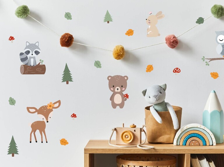 wall stickers with forest animals on a white wall